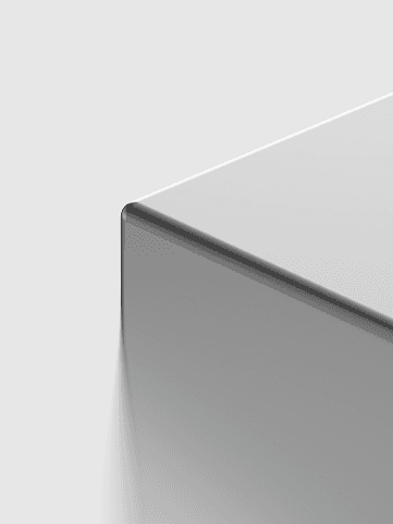 Close-up of polished silver metallic cubes representing secure, self-contained data units